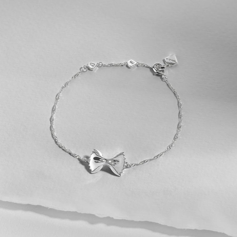 Image of Wanderlust + Co Bow Tie Pasta Bracelet 14K Gold /Rhodium Plated Jewelry Hypoallergenic Shower-safe