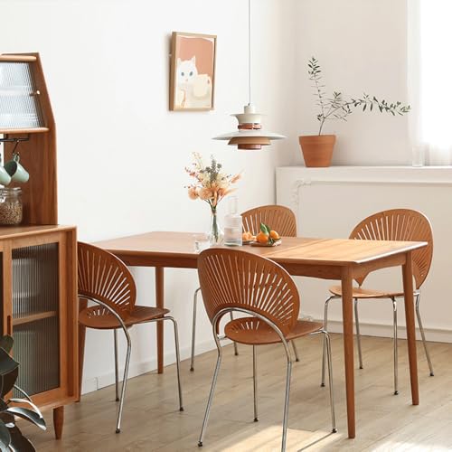 Table à manger chaude sublimée par le petit lustre LED beige