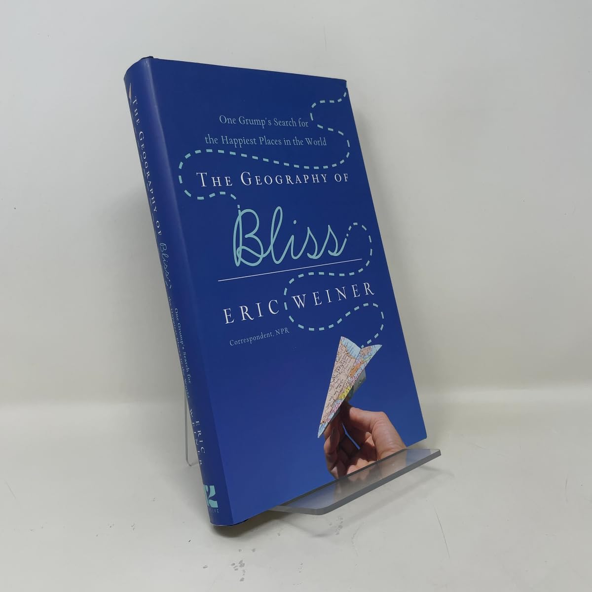Cover of The Geography of Bliss: One Grump's Search for the Happiest Places in the World