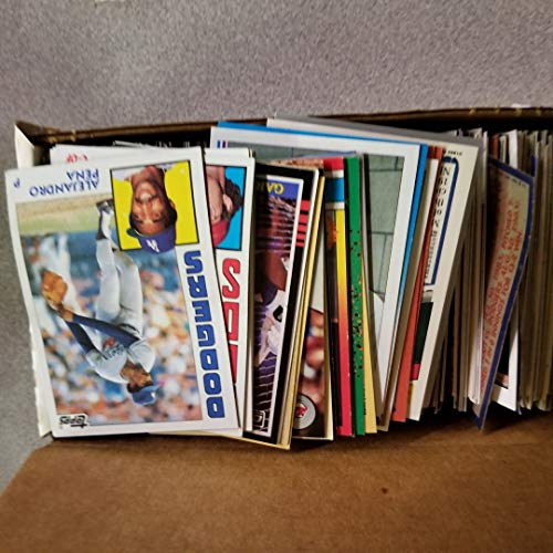 600 Baseball Cards Including Babe Ruth, Unopened Packs, Many Stars, And Hall-Of-Famers. Ships In Brand New White Box Perfect For Gift Giving. Includes At Least One Original Unopened Pack Of Topps Vintage Baseball Cards That Is At Least 25 Years Old! #TOP1