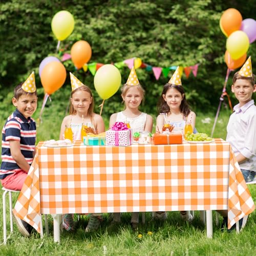 Image of WNINK 6 Pack Orange and White Checkered Rectangular Plastic Tablecloths, Orange Gingham Waterproof Disposable Table Covers 54 inch x 108 inch for Birthday, Wedding, Outdoor Picnic Camping Parties