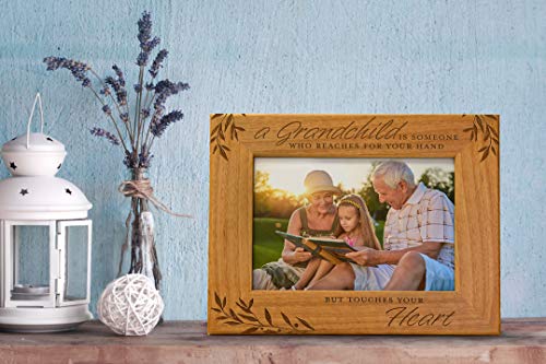 Grandparentgiftsagrandchildissomeonewhoreachesforyourhandbuttouchesyourheartnewgrandparentgiftsfirsttimegrandmaframeengravedwoodphotoframefits5x7horizontalportrait Urban Country Home Decor Grandparent gifts a grandchild is someone who reaches for your hand but touches your heart new grandparent gifts first time grandma frame engraved wood photo frame fits 5×7 horizontal portrait urban country home decor