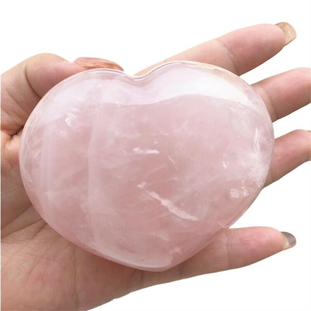 Piedra de cuarzo rosa en forma de corazón y cristales naturales para casa