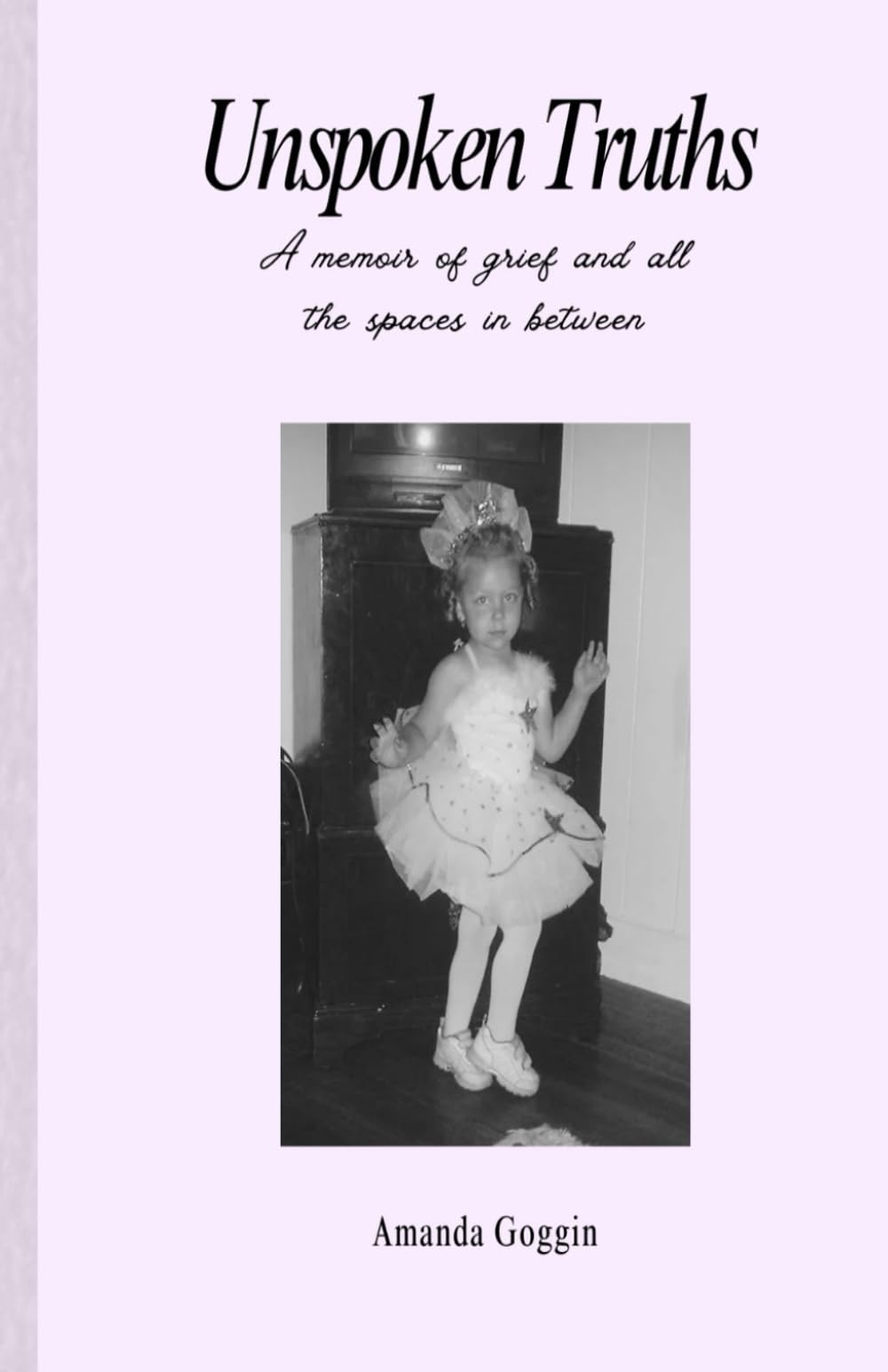 Unspoken Truths: A memoir of grief and all the spaces in between.