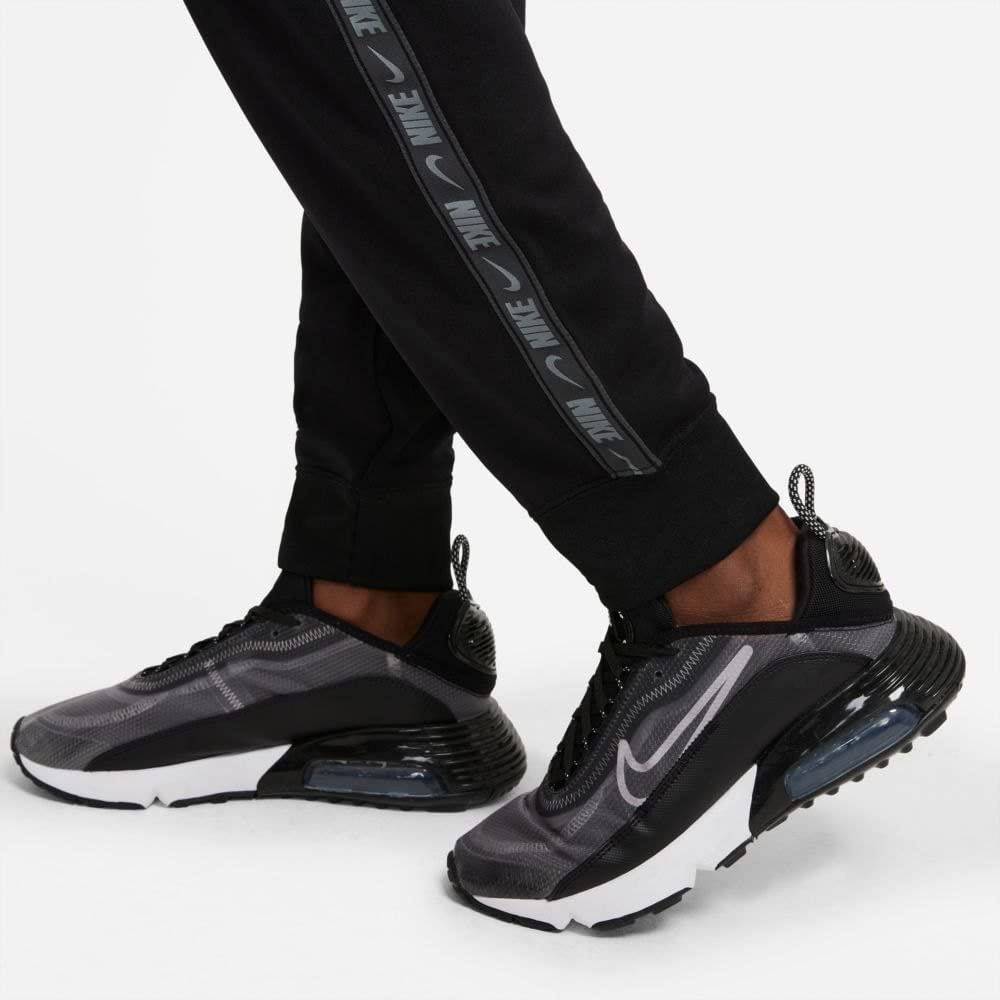 NIKE Nsw Pk Tape Reg - Spodnie dresowe Kobiety