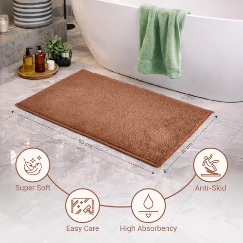 Image of Welspun Premium Bath Mats Small for Hall, Bedroom & Living Room | Solid Design | Anti Skid | More Absorbent | Soft Feel | Machine Tufted | (2 x 2 ft, Dark Brown)