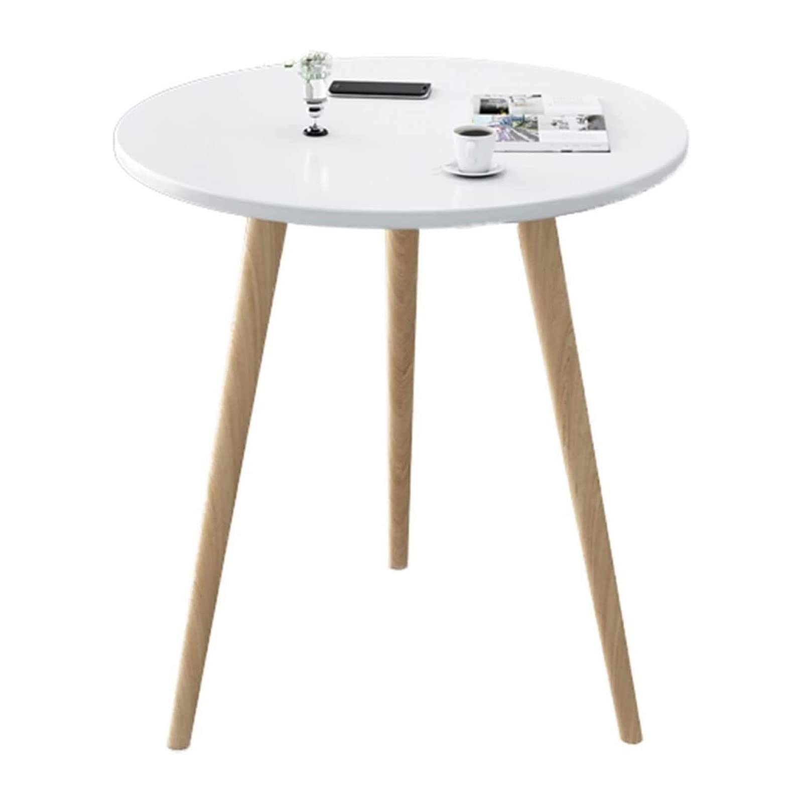Table basse ronde blanche polyvalente du salon au balcon ensoleillé