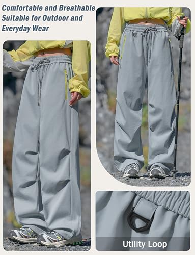 Image of FEOYA Waterproof Pants Women Light Rain Pants Parachute Drawstring Cuffs | Elastic Drawstring Waist,Zipper Large Pockets,Quick-Dry Water-Repellent Baggy Cargo Pants,Camping Hiking Pants Travel Casual