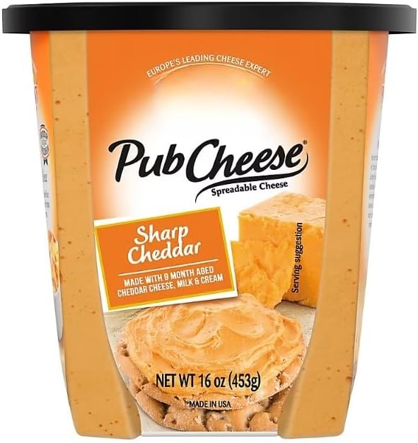 Pub Cheese sharp cheddar spreadable cheese is soft, creamy, and made with 9-month aged cheddar, milk, and cream. These simple ingredients produce a well-rounded cheese spread with high aspirations to be a party favorite. Dippable and spreadable, serve with pretzels, crackers, toasts or veggies. Perfect to enjoy with lunch, as a snack between meals, a charcuterie board or whenever that Pub Cheese craving hits. [ 16 oz , 1 lb ]