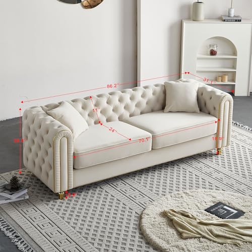 Image of KEIKI 86 inch Chesterfield Velvet Button Tufted Sofa with High Density Foam Cushions and 2 Toss Pillows, Modern Style 3-Seater Couch with Gold Strip Trim Decoration, Easy Assembly, for Living Room, Beige