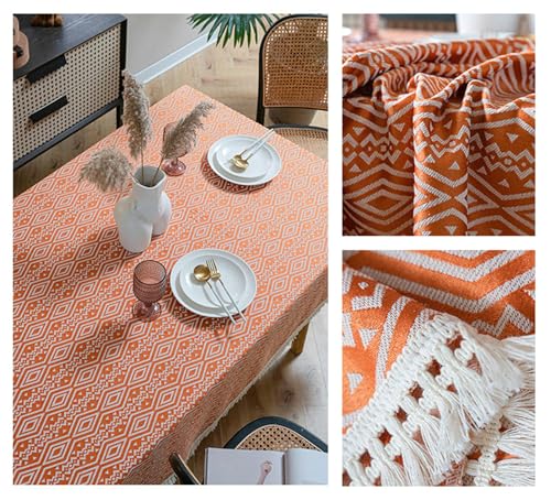 Nappe à motif totem géométrique orange en polyester avec pompons élégants