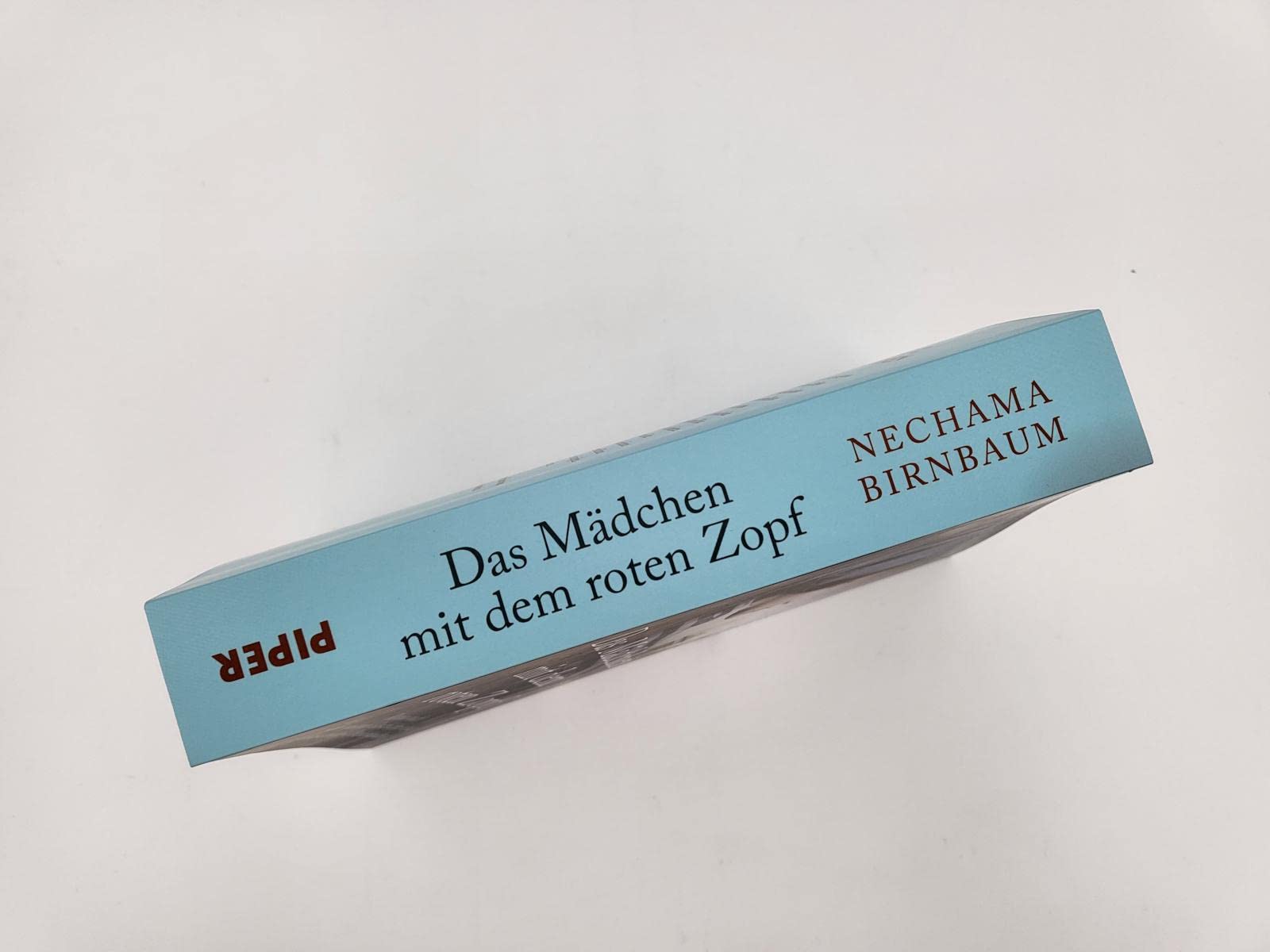 Das Mädchen mit dem roten Zopf: Roman nach der wahren Geschichte einer Auschwitz-Überlebenden | Holocaust-Memoir