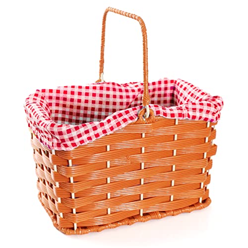 Un petit panier intérieur rouge imitation osier en plastique avec une anse pour le tenir à la main.
