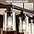 5-Light Kitchen Island Lighting & Farmhouse Dining Room Light Fixtures Over Table, Rustic Wood Linear Chandelier Adjustable Ceiling Hanging Pendant - Rotating Design, Customizable Shapes, Clear Glass