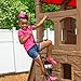 Step2 Naturally Playful Adventure Lodge Play Center with Glider, Kids Outdoor Playset, Two Tier Backyard Playground Set, Slide, Swings, Rope Ladder, Basketball Hoop, Jungle Gym, Children 3-8 Years Old