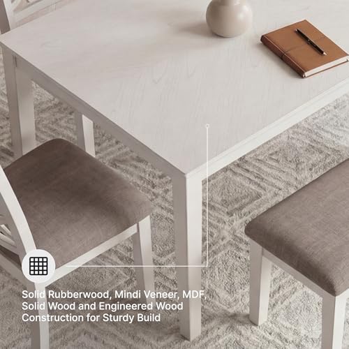 Image of Signature Design by Ashley 6-Piece Dining Set with Bench, Antique White | Space-saving table with tuck-under bench, Fretwork chairs with textured gray upholstery, Erinberg Series