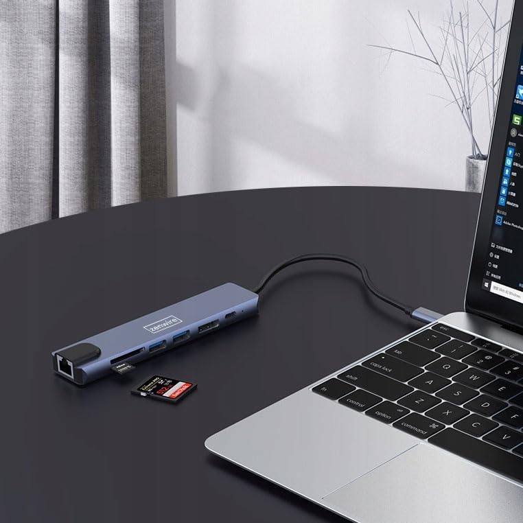 Zenwire USB-C Hub Adapter EB7 connected to a laptop with an SD card inserted.
