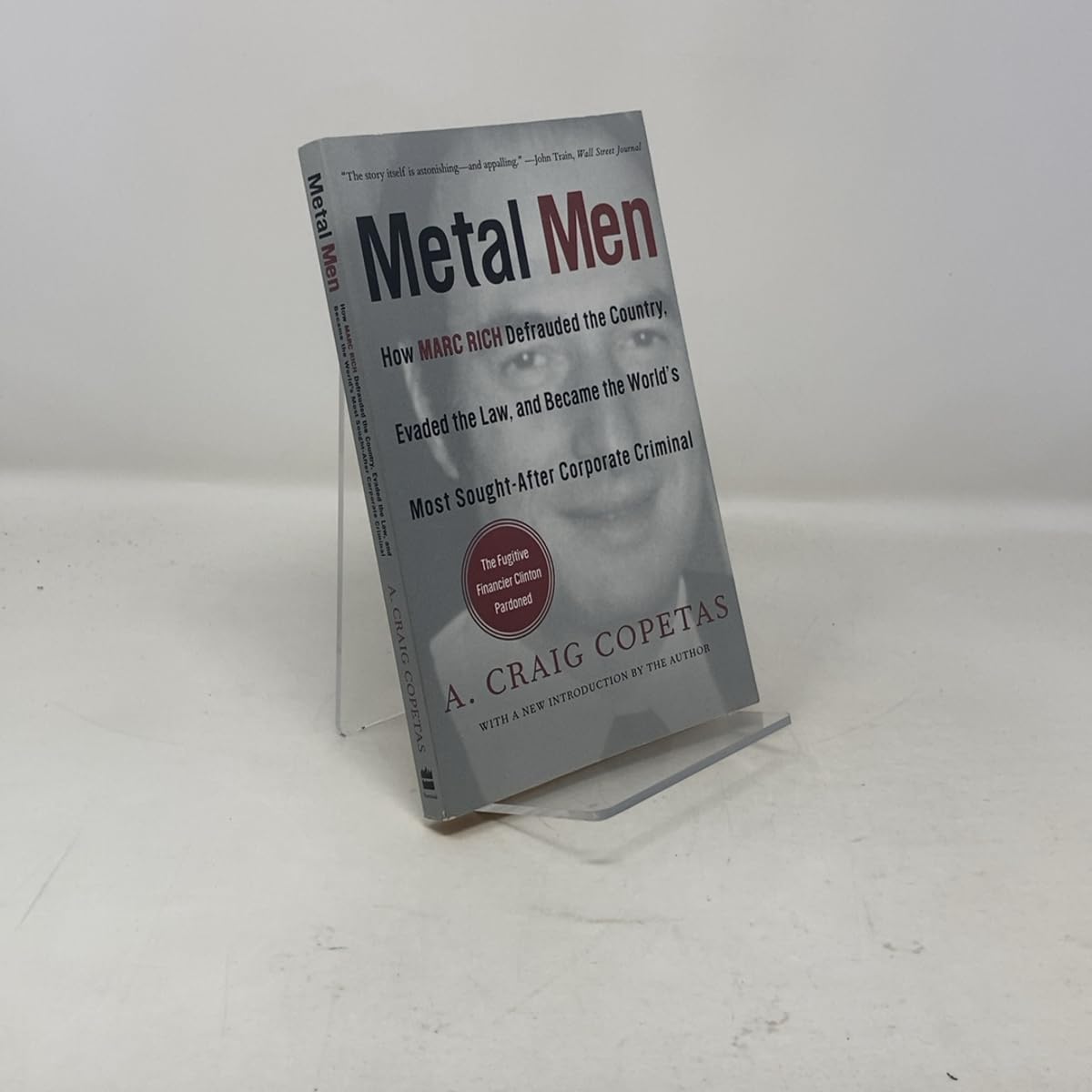 Metal Men: How Marc Rich Defrauded the Country, Evaded the Law, and Became the World's Most Sought-After Corporate Criminal Paperback – April 3, 2001