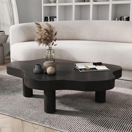 Table basse d'angle ronde en bois pour optimiser les petits salons encombrés