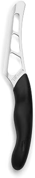 Model 1504 CUTCO Cheese Knife w/ 5.5" Micro-D serrated edge blade & 5" black Soft Comfort-grip handle. Holes on blades surface helps cheese fall away during cutting.