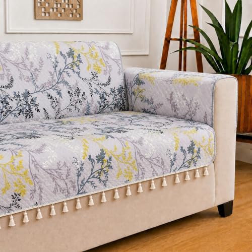 Image of STITCHNEST 'Frostvine Collection' 2 Seater Sofa Cover | Full Coverage with Armrest Pockets | Cotton Quilted Fabric, Decorative Tassels, Washable & Durable for Modern Living