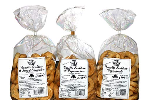 Pack 3 Taralli di Puglia. Produit de boulangerie idéal pour les collations. Le paquet contient des taralli avec de l'huile d'olive, des graines de fenouil