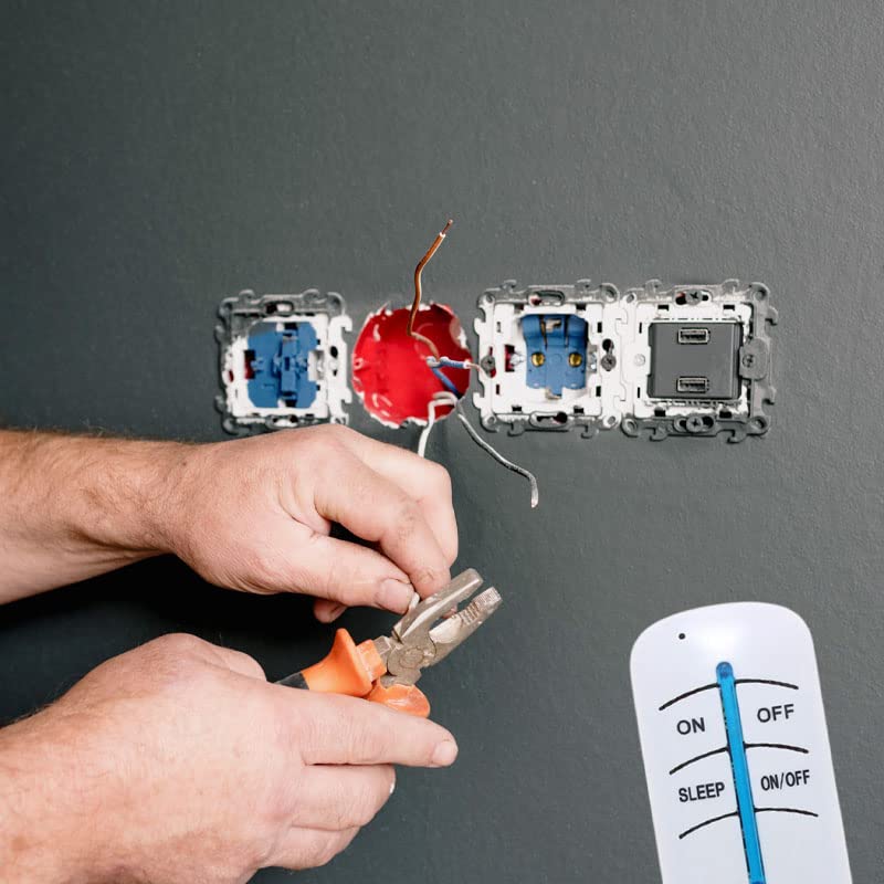 Electrician wiring a wall switch