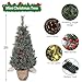 3 FT Potted Artificial Christmas Tree with 78 Lights, Pre-Lit Holiday Xmas Tree with Christmas Snow Cart Base, Tabletop Snow Flocked Christmas Tree with Pine Cones, Red Berries