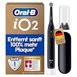 Oral-B iO Series 2 Elektrische Zahnbürste mit 1 Aufsteckbürste, Schwarz - Electric Toothbrush, GUT GETESTET (2,2) von STIFTUNG WARENTEST, Inkl.Reise-Etui Und 3 Putzmodi für Zahnpflege