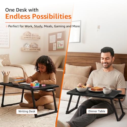 Image of Amazon Basics Engineered Wood Foldable Laptop Table with Cup and Pen Holder, Tablet and Mobile Phone Groove | Mini Drawer, Use for Writing, Bed, Breakfast (60L x 40W x 25H cm, Black)