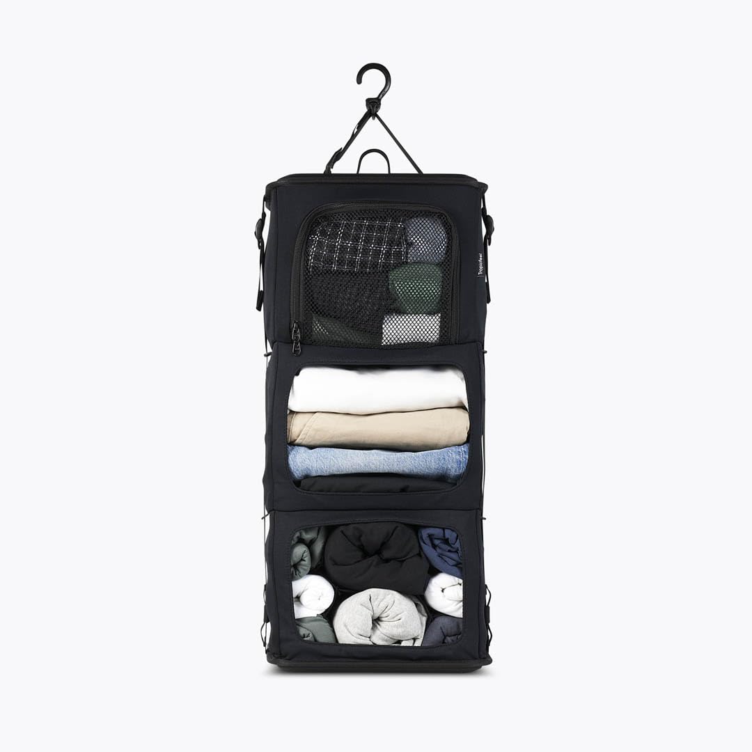 Tropicfeel Szafa w kolorze czarnym, podróżny system garderoby/organizer na ubrania, pasuje do każdego plecaka lub torby o wymiarach 60 cm x 28 cm x 18 cm, wiszący organizer podróżny (cały czarny)