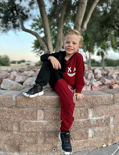 Image of Arshiner Boys Cartoon Face Print Two Tone Crewneck Sweatshirt and Pants Set Tracksuits Outfits Size (2T - 7-8)