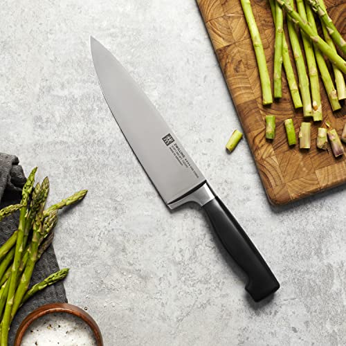 Image of ZWILLING Four Star 8-inch Razor-Sharp German Chef's Knife, Made in Company-Owned German Factory with Special Formula Steel perfected for almost 300 Years, Dishwasher Safe