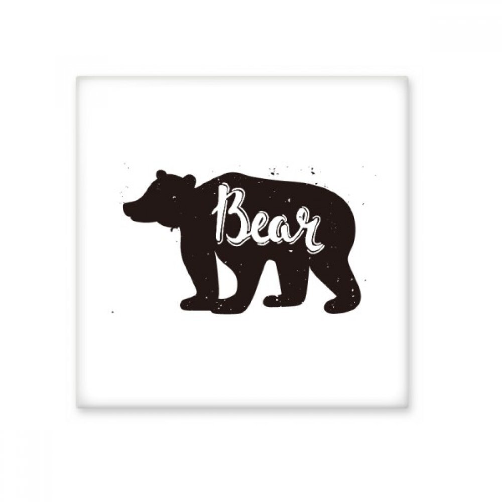 Carreaux salle de bains ternes ? Sublimez votre cuisine avec la céramique ours noir et blanc