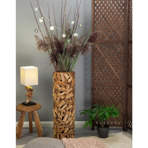 Vase de sol Vela en teck de 79 cm pour sublimer les angles vides
