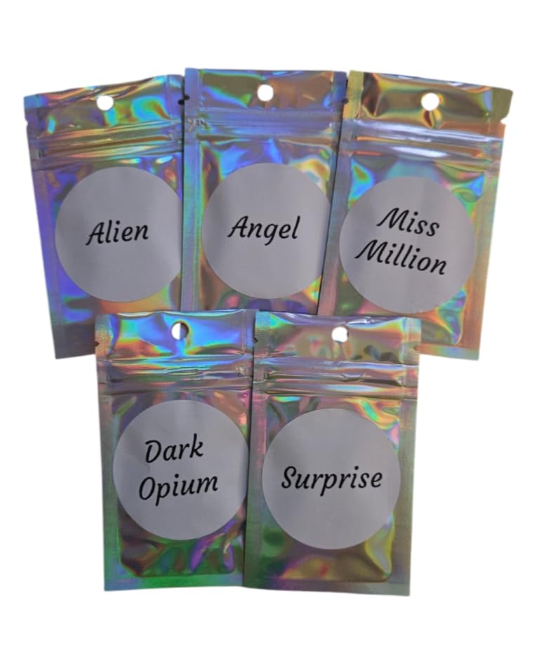Scented Vacuum freshner discs-long lasting strong designer inspired perfume scents(Alien Angel Miss million dark opium) 4 packets each contaning 2 disc (3cm) plus one surprise scent.