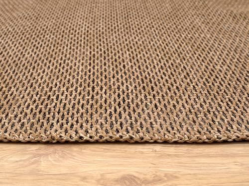 Large natural jute rug safely placed on a family-friendly outdoor patio.