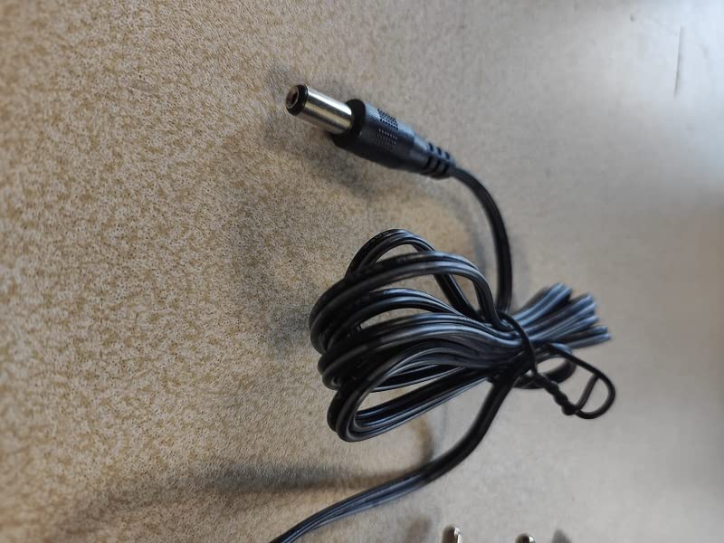 Détail du connecteur RCA et boîtier du chargeur 12V