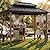 Sunjoy Wooden Grill Gazebo with AC Power Port, 8 x 12 ft. Steel Hardtop Outdoor Gazebo for Year-Round Grilling, Cedar Framed Gazebo with Built-in Electrical Outlets and Decorative Fence, Brown