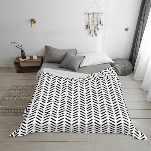 Couverture en flanelle cocooning pour des soirées canapé parfaites