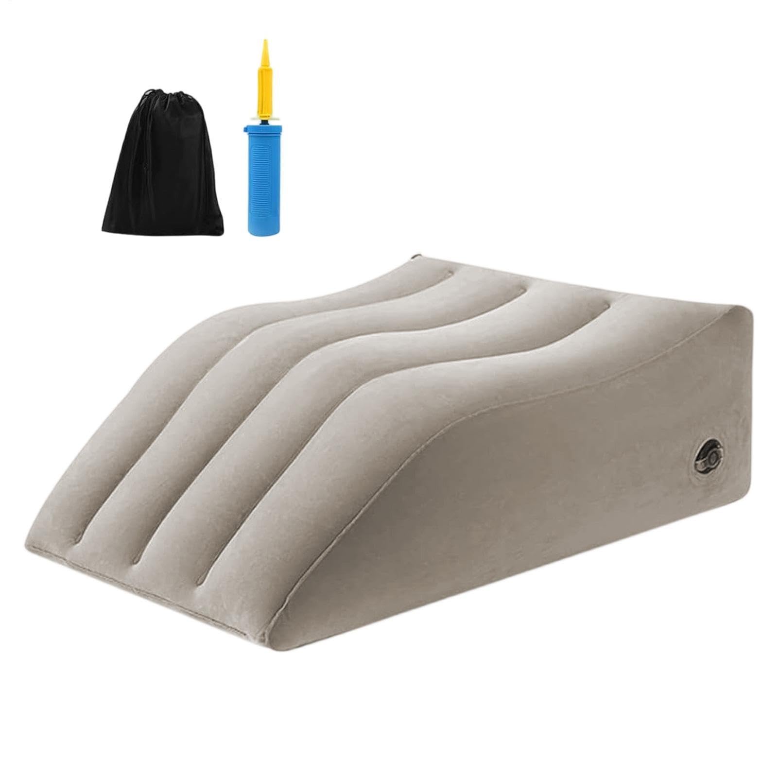 Coussin gonflable pour genoux contre les jambes lourdes au lit