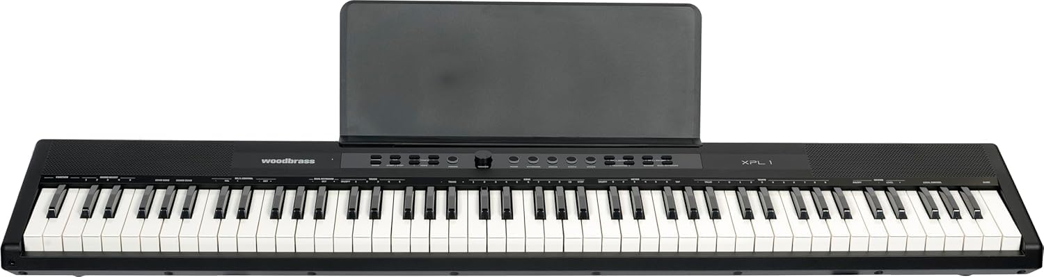 Woodbrass XPL1 - Pianoforte digitale portatile amplificato, 88 note, leggero, compatto e versatile, 25 suoni di qualità e amplificazione stereo, tastiera per imparare, perfezionare o giocare sul palco