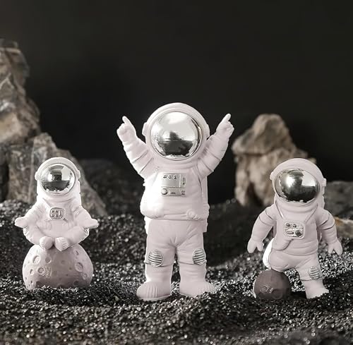 Image of REWOP Astronaut Figurine Set of 3 - Cute Space Theme Desk Decor, Moon Surface Resin Statues for Home, Office, Car Dashboard, Gift for Kids & Space Lovers (Silver)