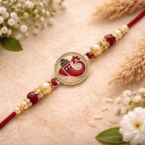 Image of Riddhika Ventures Religious Gold Plated Meenakari Sacred Ganesha Rakhi with Roli Chawal and Greeting Card