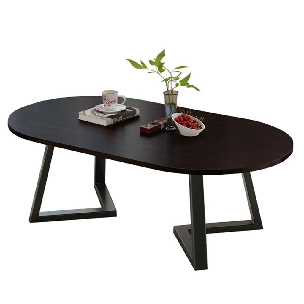 Table basse ronde ovale en bois noir pour petit salon moderne