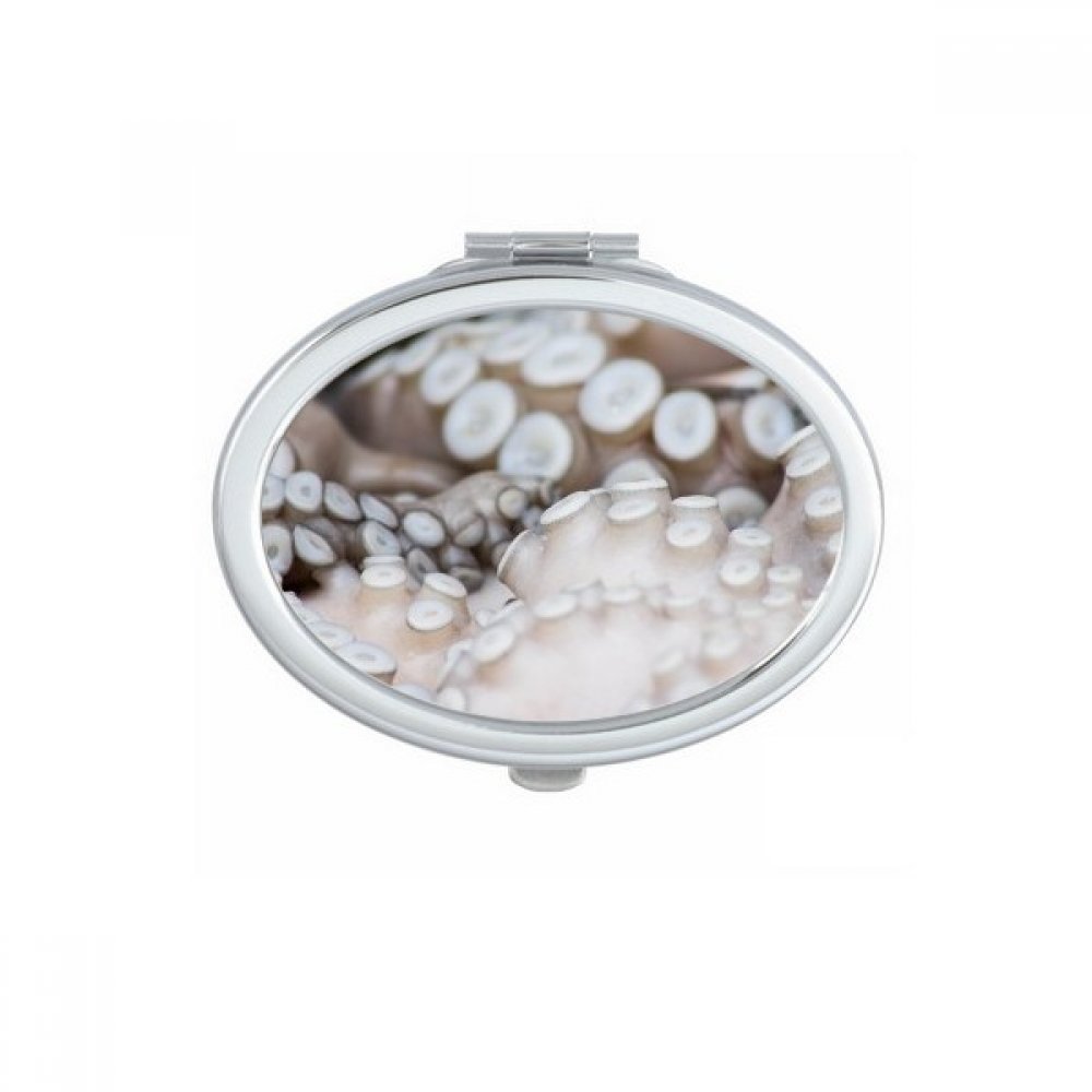 Miroir ovale maquillage fait main, réflexion nette et design compact