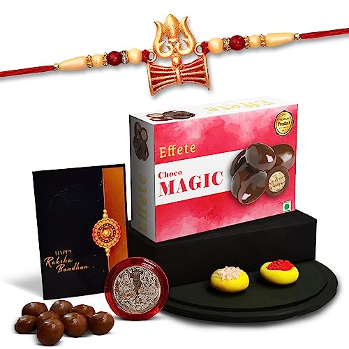 Image of DeoDap Multicolor Trishul Rakhi Bracelet Magic 32gm with Choco Magic 32gm, Silver Pooja Coin, Tilak Set, Greeting Card - Rakhi Gift for Brother