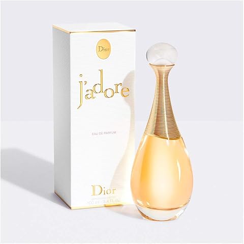 Frasco do Dior J'adore Eau de Parfum dourado ao lado da caixa