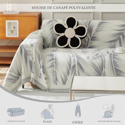 Couverture de canapé extensible idéale pour protéger le salon des animaux