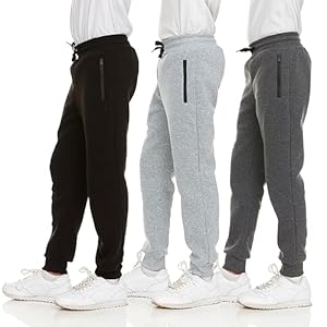 PURE CHAMP Paquete de 3 pantalones deportivos de forro polar para niños, con bolsillo con cremallera y cordón, talla 4-20